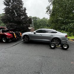 BidCars Boston - Car getting towed after engine failure.