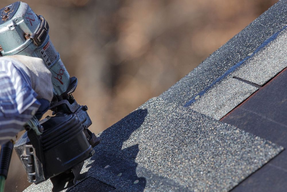 Slide of Iron Hawk Roofing
