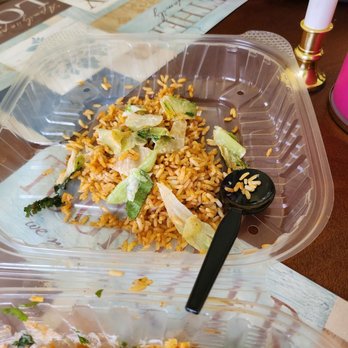 Chilis - two plastic containers of food on a table - Bars Near Me - Detroit, Michigan