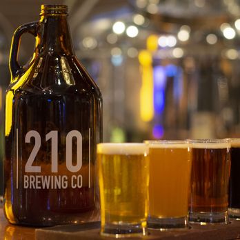 210 Brewing CO - beer glasses and a growler - New American Near Me - Arlington, Washington