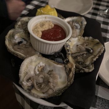 Cafe Calamari - a plate of oysters with ketchup - Italian Near Me - Williams Bay, Wisconsin Cafe Calamari - a plate of oysters with ketchup - Italian Near Me - Williams Bay, Wisconsin