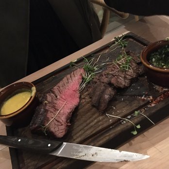 South And Central - 16 oz Skirt Steak cooked perfectly medium rare with a side of chimichurri and HUANCAINA SAUCE - Latin American Near Me - Charlottesville, Virginia South And Central - 16 oz Skirt Steak cooked perfectly medium rare with a side of chimichurri and HUANCAINA SAUCE - Latin American Near Me - Charlottesville, Virginia