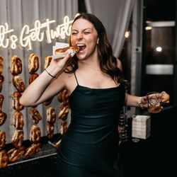 Knotting Hills Event Venue & Resort - Guest enjoying late night wedding snack at Knotting Hills The Lake