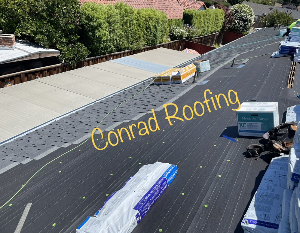 Slide of Conrad Roofing Service