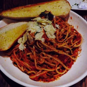 Original Joes - a plate of spaghetti and bread - Bars Near Me - Duncan, British Columbia Original Joes - a plate of spaghetti and bread - Bars Near Me - Duncan, British Columbia