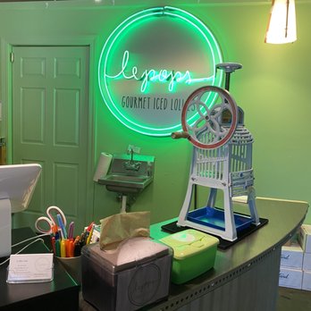 Le Pops - a counter with a neon sign above it - Ice Cream & Frozen Yogurt Near Me - Little Rock, Arkansas Le Pops - a counter with a neon sign above it - Ice Cream & Frozen Yogurt Near Me - Little Rock, Arkansas