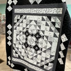 Apron Strings Quilt Shop - Shop samples are often changing. This black and white beauty was added by Miss Helen in August, It will stay up as long as we have kits.