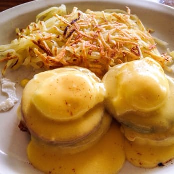 Boulevard Cafe - Eggs Benedict for $10. Two poached eggs, Canadian Bacon, holandaise sauce, grilled English muffin with Yukon gold hash brown. - New American Near Me - Daly City, California