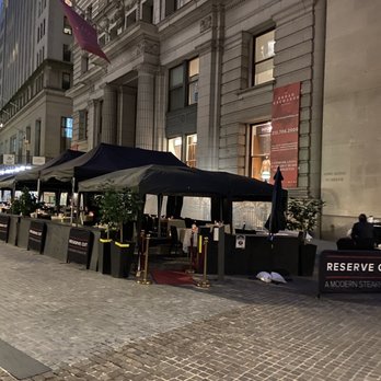 Reserve Cut - a sidewalk with tables and umbrellas - Steakhouses Near Me - New York, New York Reserve Cut - a sidewalk with tables and umbrellas - Steakhouses Near Me - New York, New York