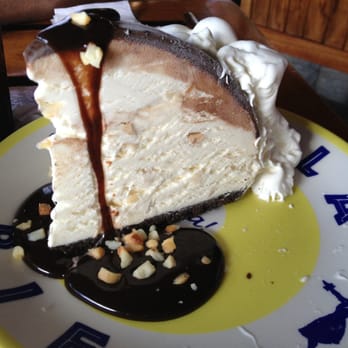 Kimo's Maui - Hula pie, a must! Macadamia nut ice cream, Oreo cookie crust, chocolate shell and a hot fudge drizzle.....oh+whipped cream - Seafood Near Me - Lahaina, Hawaii Kimo's Maui - Hula pie, a must! Macadamia nut ice cream, Oreo cookie crust, chocolate shell and a hot fudge drizzle.....oh+whipped cream - Seafood Near Me - Lahaina, Hawaii