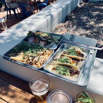 The Nest - Elote fries, two salmon tacos, three brisket tacos - Waffles Near Me - Ojai, California The Nest - Elote fries, two salmon tacos, three brisket tacos - Waffles Near Me - Ojai, California