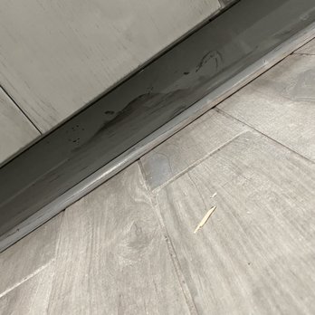 New Vision Granite & Services - Spilled stain all over the floor and cabinets and left. Smh - Cabinetry Near Me - Chicago, Illinois