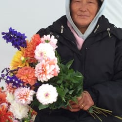 Green Bay Farmer's Market - Nice flower vendor lady who was kind enough to allow me to take her picture. As you can see, the flowers are also beautiful.