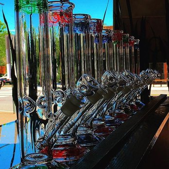 Burn & Brew - a row of glasses on a bar - Tobacco Shops Near Me - Arlington, Virginia