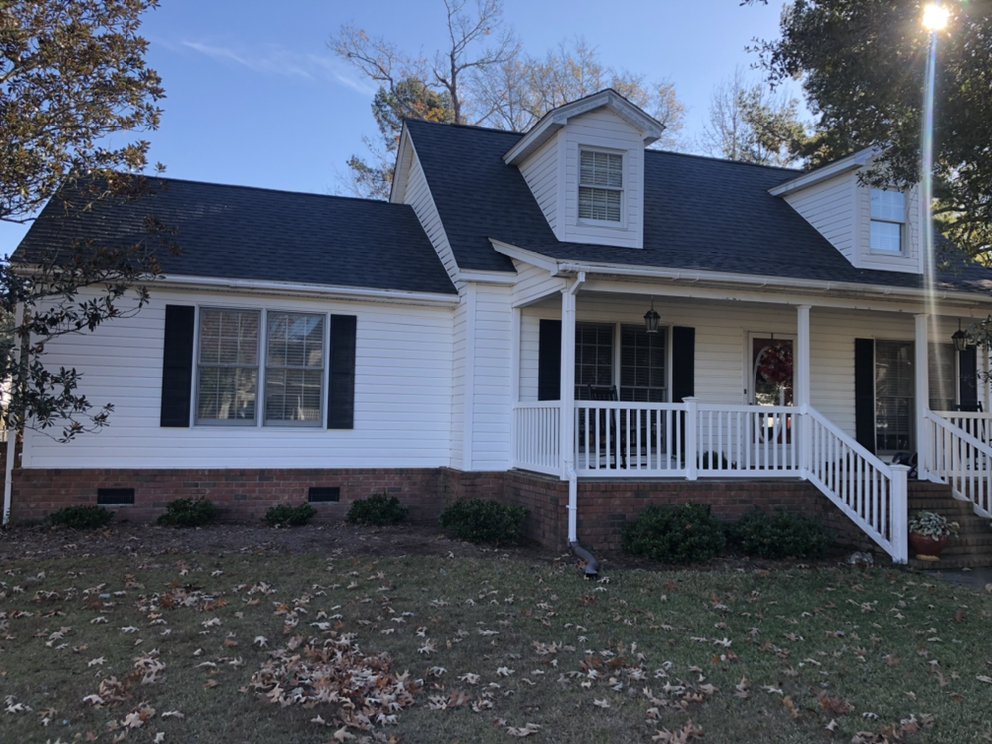 Slide of Rigid Roofing & Construction