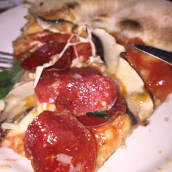 Lucali - Toppings: pepperoni, mushrooms, garlic and basil - Pizza Near Me - Brooklyn, New York Lucali - Toppings: pepperoni, mushrooms, garlic and basil - Pizza Near Me - Brooklyn, New York
