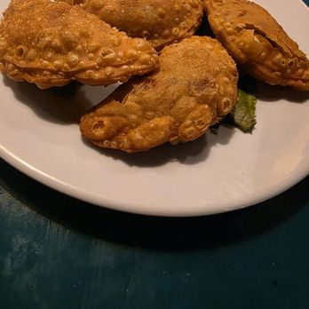 Mahi Mahi Bar and Grill - Mini empanadas half eaten - Seafood Near Me - Dorado, Puerto Rico Mahi Mahi Bar and Grill - Mini empanadas half eaten - Seafood Near Me - Dorado, Puerto Rico