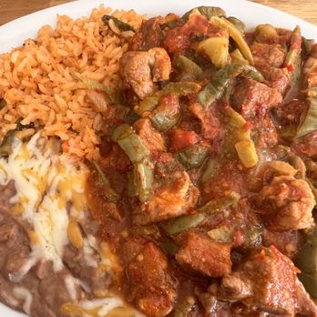 Los Tres Cochinitos - Nopales dish with red salsa in pork. - Mexican Near Me - Wilmington, California