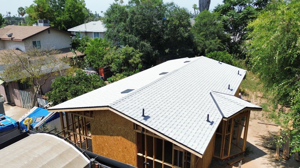 Slide of Canelas Roofing