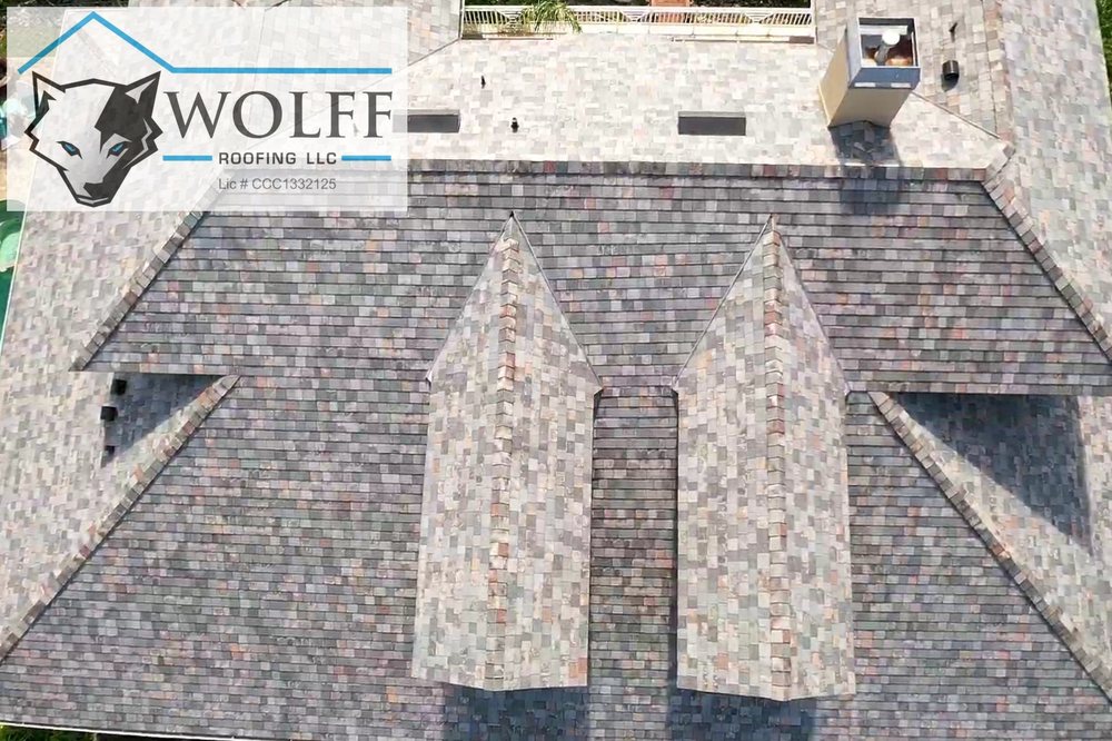 Slide of Wolff Roofing