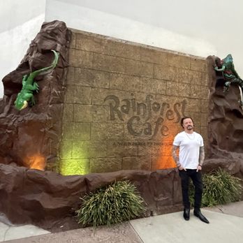 Rainforest Cafe - Boyfriend in front of sign - American Near Me - Ontario, California Rainforest Cafe - Boyfriend in front of sign - American Near Me - Ontario, California