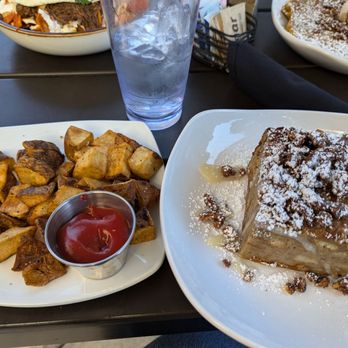 Easy Like Sunday - L-R: Side of Home Fries, $5 prior to tax. Seasonal Bread Pudding, $8.95 prior to tax - Breakfast & Brunch Near Me - Baltimore, Maryland Easy Like Sunday - L-R: Side of Home Fries, $5 prior to tax. Seasonal Bread Pudding, $8.95 prior to tax - Breakfast & Brunch Near Me - Baltimore, Maryland