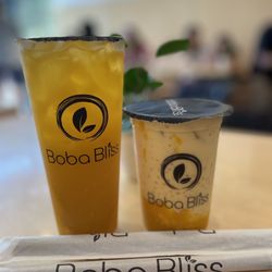 Boba Bliss - L) Mango green tea R) mango sago  Both made with real mango!