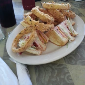 Country Kitchen - Club sandwich with onion rings - Buffets Near Me - Mandeville, Louisiana Country Kitchen - Club sandwich with onion rings - Buffets Near Me - Mandeville, Louisiana