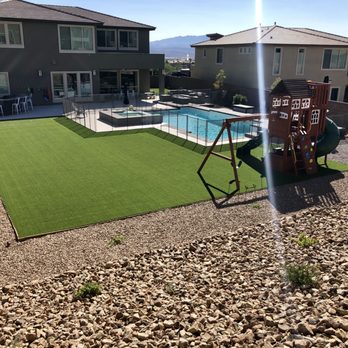 Beautify - View of whole backyard from the top corner of the berm. - Landscaping Near Me
