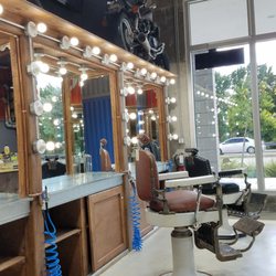 The Spot Barbershop - Doral Midtown - Motorcycles and cool chairs!