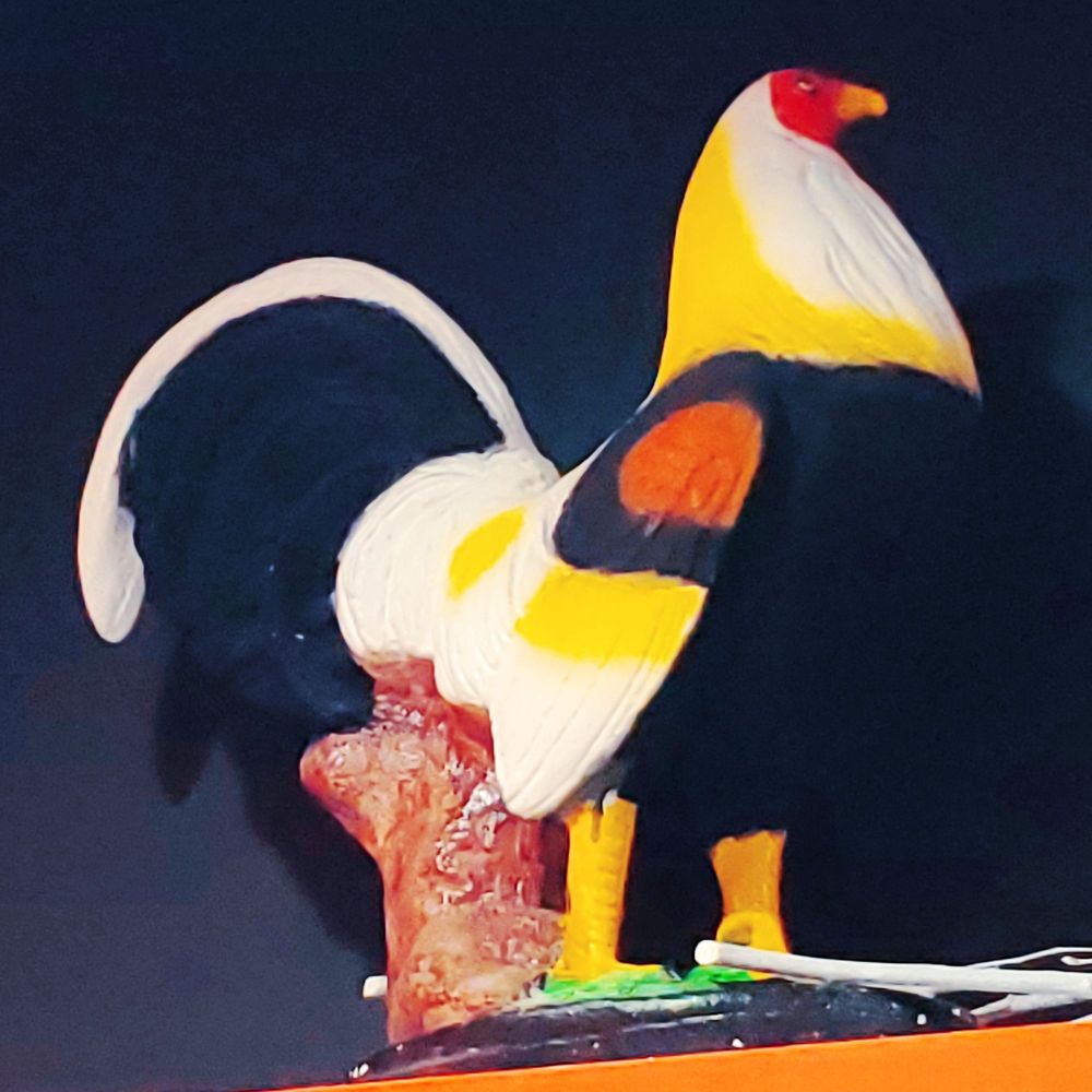 HonduPollo - a close up of a toy rooster - Honduran Near Me - Springfield, Virginia