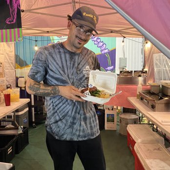 Vegan Circus - My finished product held up by chef Esteban - Food Trucks Near Me Vegan Circus - My finished product held up by chef Esteban - Food Trucks Near Me