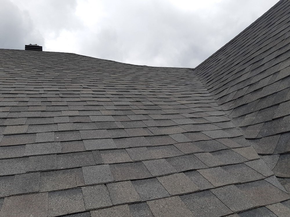 Slide of Bystrom Roofing