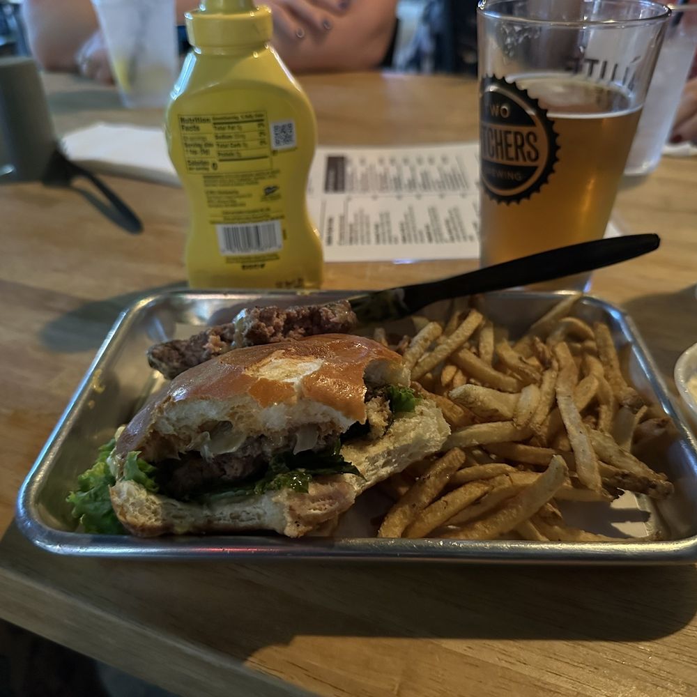 Double double, with one patty removed, over salted fries, and flat beer