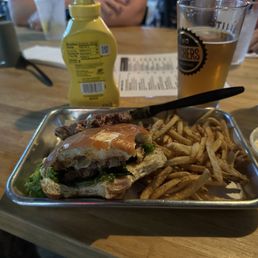 Double double, with one patty removed, over salted fries, and flat beer