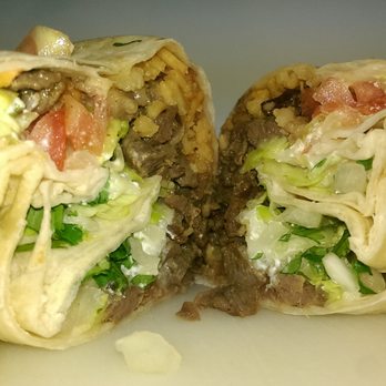 Taqueria La Vecindad - Cilantro and onion added to the steak burrito. - Mexican Near Me - Milwaukee, Wisconsin