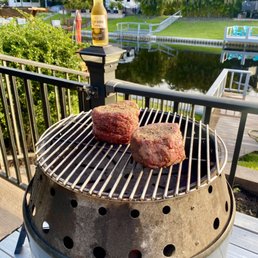 Filets low and slow over charcoals and a beverage of course :-) Filets low and slow over charcoals and a beverage of course :-)