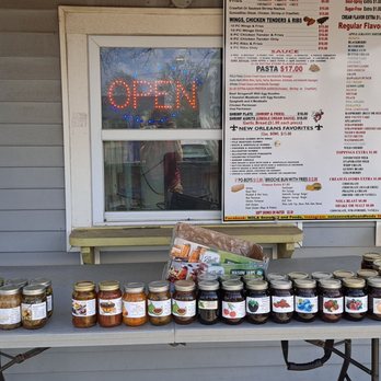 Nola Snowball - a table with jars of jams - Shaved Snow Near Me - Chalmette, Louisiana Nola Snowball - a table with jars of jams - Shaved Snow Near Me - Chalmette, Louisiana