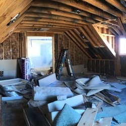 JCM Builder - The framed space above the garage as we found it when we purchased the home.