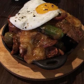 Bosscat Kitchen & Libations - Poutine with fried duck egg! - New American Near Me - Irvine, California Bosscat Kitchen & Libations - Poutine with fried duck egg! - New American Near Me - Irvine, California
