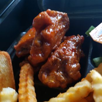Zaxbys - The wings were definitely breaded then deep fried. After that it was just dipped/drenched in sauce. It was aiight... just aiight - Fast Food Near Me - San Marcos, Texas