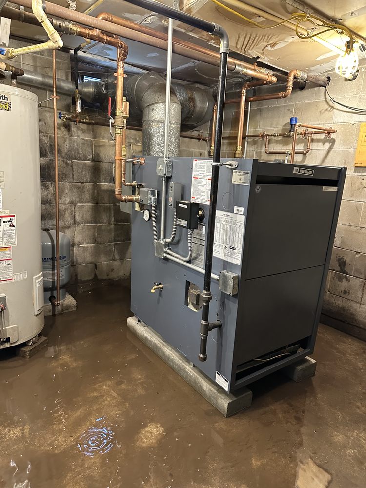 Slide of JL plumbing and heating