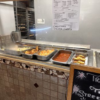 Crown Bakery - a view of a buffet counter - Caribbean Near Me - Washington, DC, District of Columbia