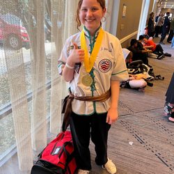 Master Gohring's Tai Chi & Kung Fu - Me at a martial arts tournament as a brown sash. I ended up tying for first place gold in sparring with a black sash.