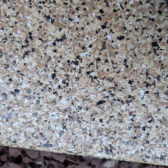 Foxy Coatings - Crack in the patio with the Foxy Coatings flexible coating. - Flooring Near Me - Reading, Pennsylvania Foxy Coatings - Crack in the patio with the Foxy Coatings flexible coating. - Flooring Near Me - Reading, Pennsylvania