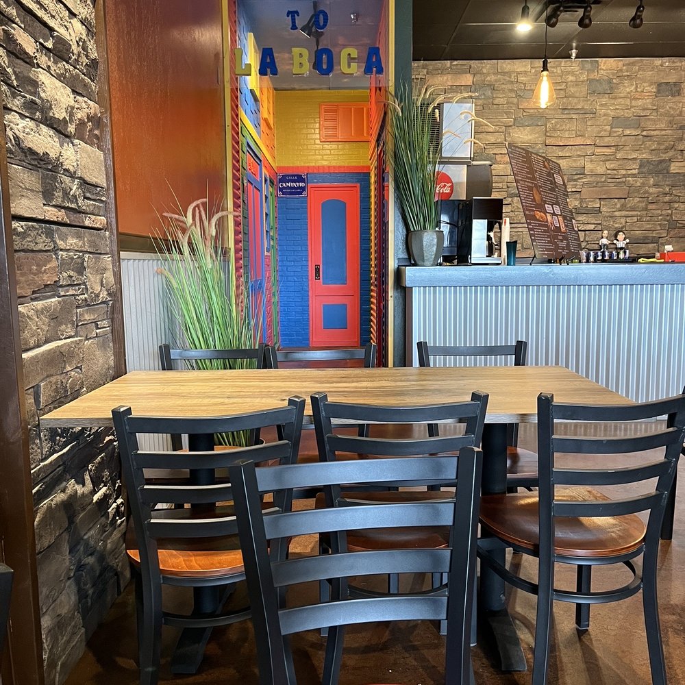 Tango's Empanadas & Grill - Meridian - a table and chairs - Empanadas Near Me - Meridian, Idaho Tango's Empanadas & Grill - Meridian - a table and chairs - Empanadas Near Me - Meridian, Idaho