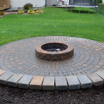 Element Landscaping - a brick fire pit in a backyard - Landscaping Near Me - Nowthen, Minnesota Element Landscaping - a brick fire pit in a backyard - Landscaping Near Me - Nowthen, Minnesota