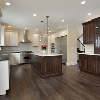 Spike Construction - a large kitchen with a center island - General Contractors Near Me Spike Construction - a large kitchen with a center island - General Contractors Near Me