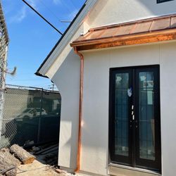 Platinum Roofing - Custom composer standing seam roof with copper fascia and gutter system