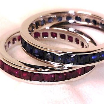 Thomas Jewelers - Custom Designed and Hand Made channel set Princess Cut Ceylon Sapphires and Burmese Ruby matching double anniversary bands. - Jewelry Near Me - Des Plaines, Illinois Thomas Jewelers - Custom Designed and Hand Made channel set Princess Cut Ceylon Sapphires and Burmese Ruby matching double anniversary bands. - Jewelry Near Me - Des Plaines, Illinois